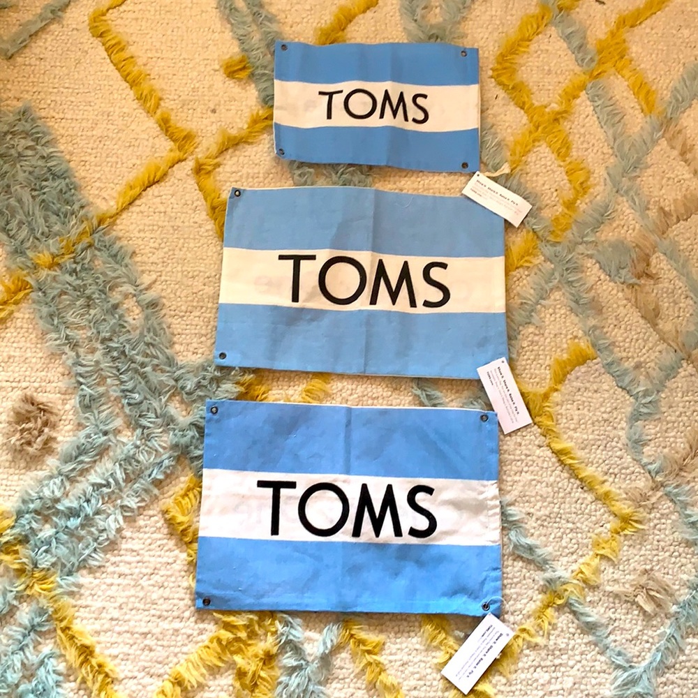 TOMs drawstring dust bags/flags